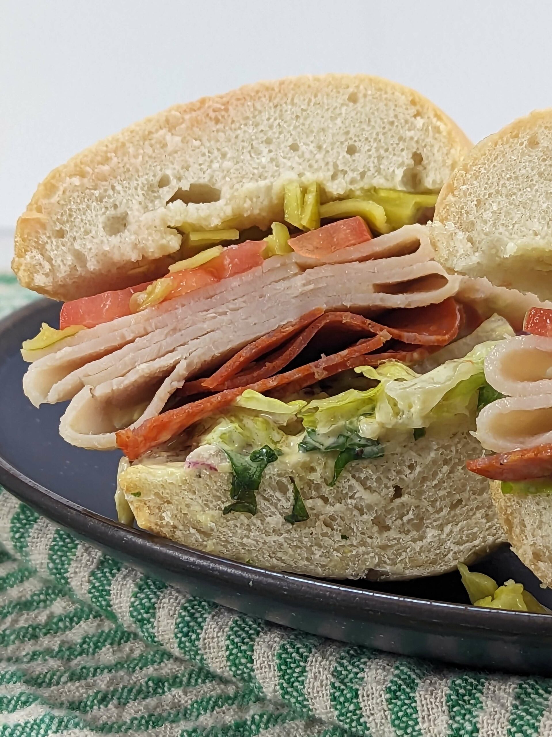 A side eye view of the sandwich cut in half.