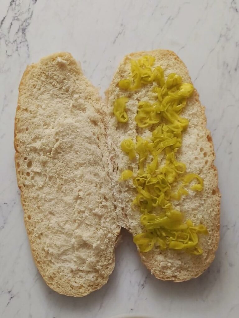 Bread topped with pepperoncinis.