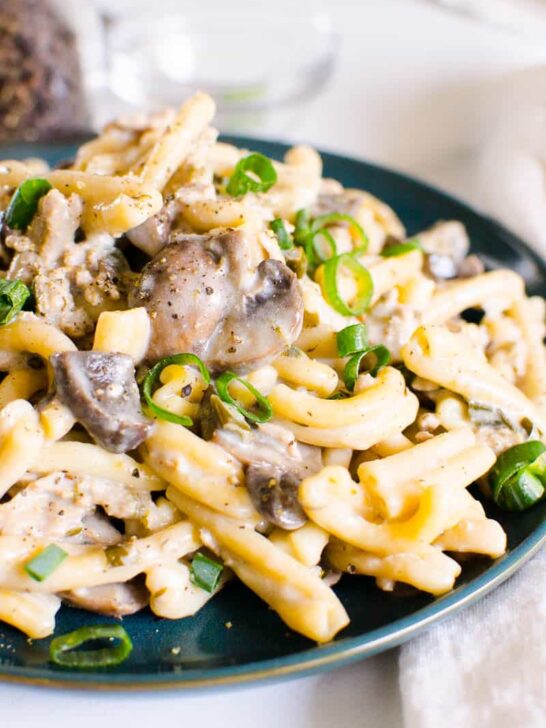 Instant Pot ground beef stroganoff topped with green onions.