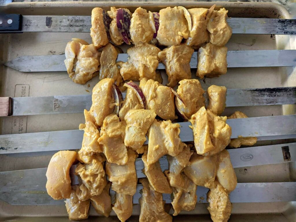 Tandoori chicken tikka on the grill..
