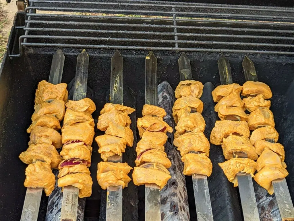 Tandoori chicken tikka on the grill..