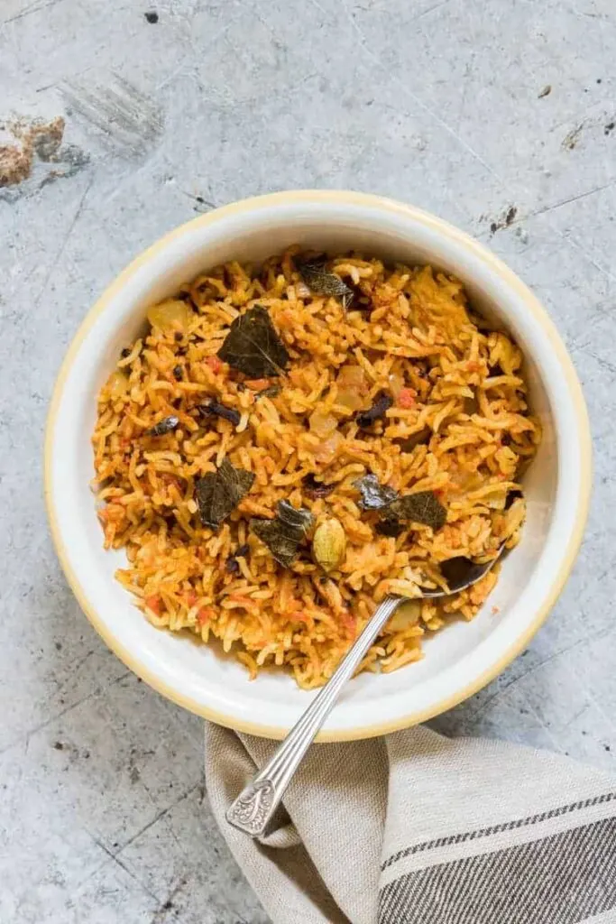 Tomato rice in a bowl.