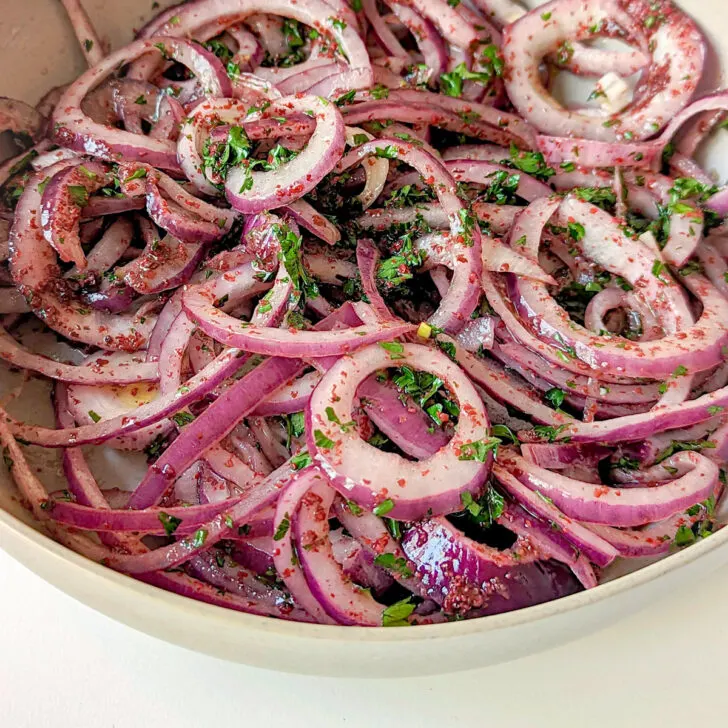 Sumac onions in a small bowl.