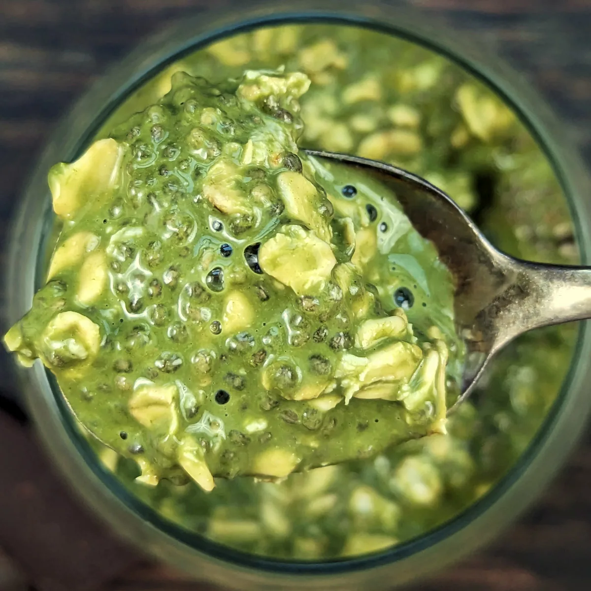 Matcha overnight oats in a glass.