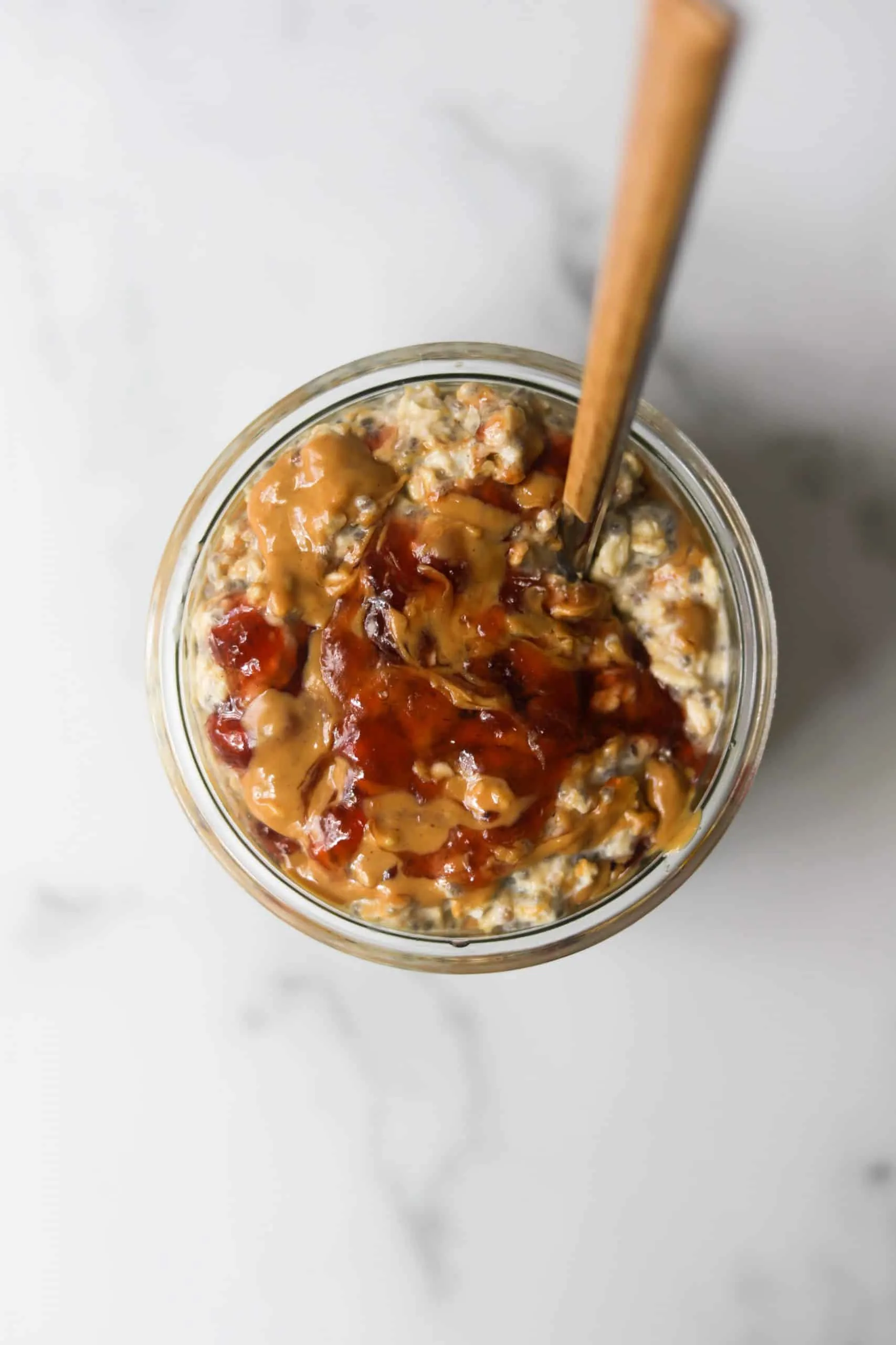 Overnight Oats topped with peanut butter and jelly.