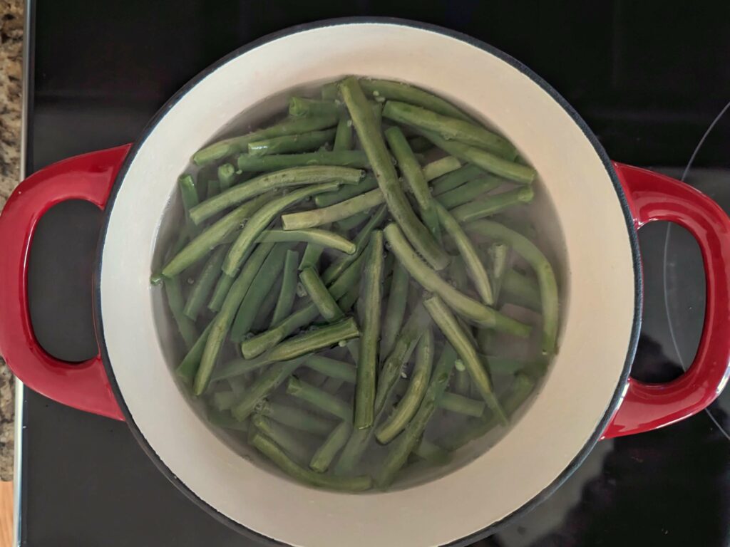 Green beans boiling in salt water.