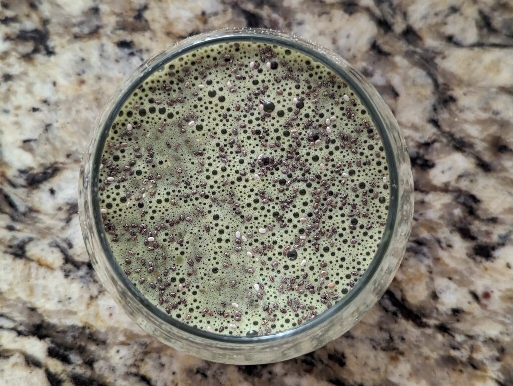 Matcha and milk added to the oats and chia seeds.