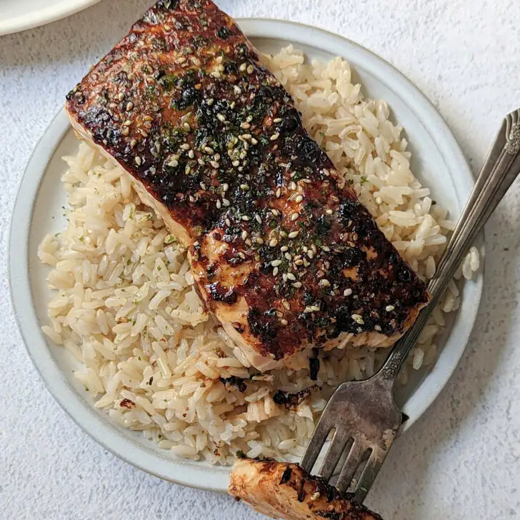 Furikake salmon on a plate with rice.