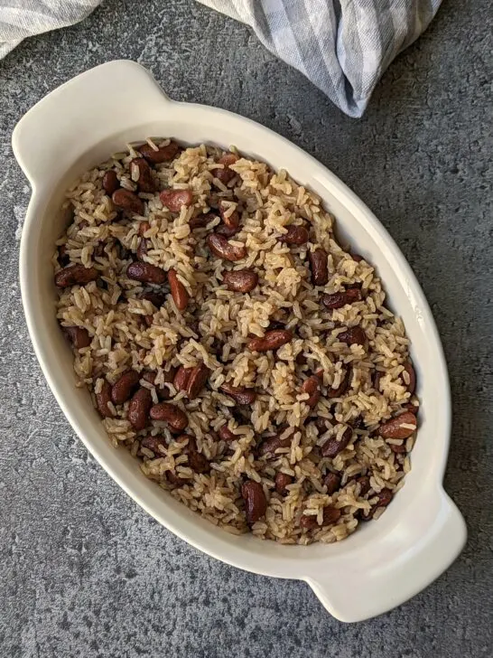Jamaican rice and peas in a serving bowl.