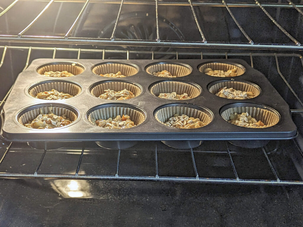 The muffins baking in the oven.