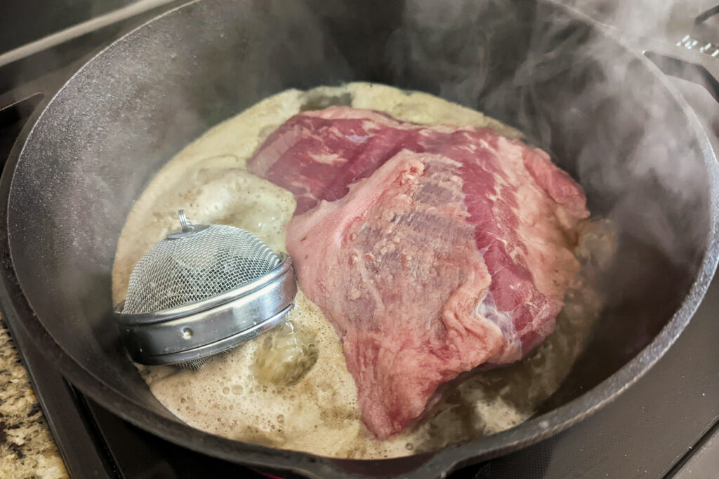 Liquid added to the meat in the dutch oven.
