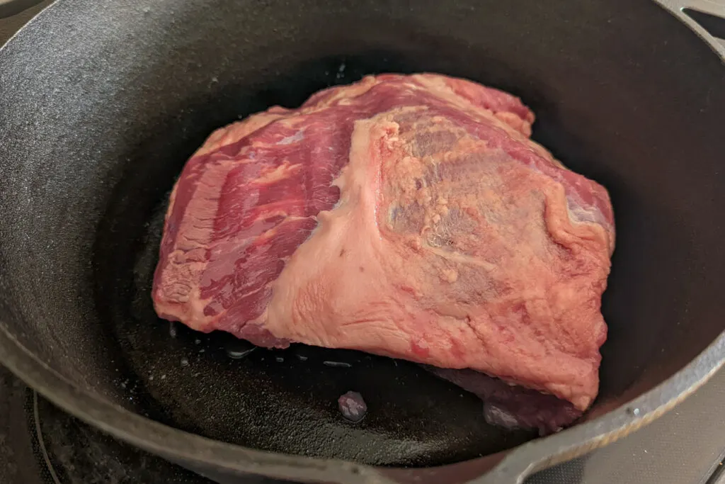 Corned beef in a dutch oven. 