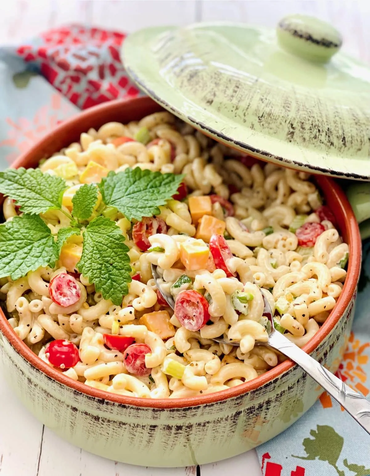A close up of a bowl of macaroni salad.