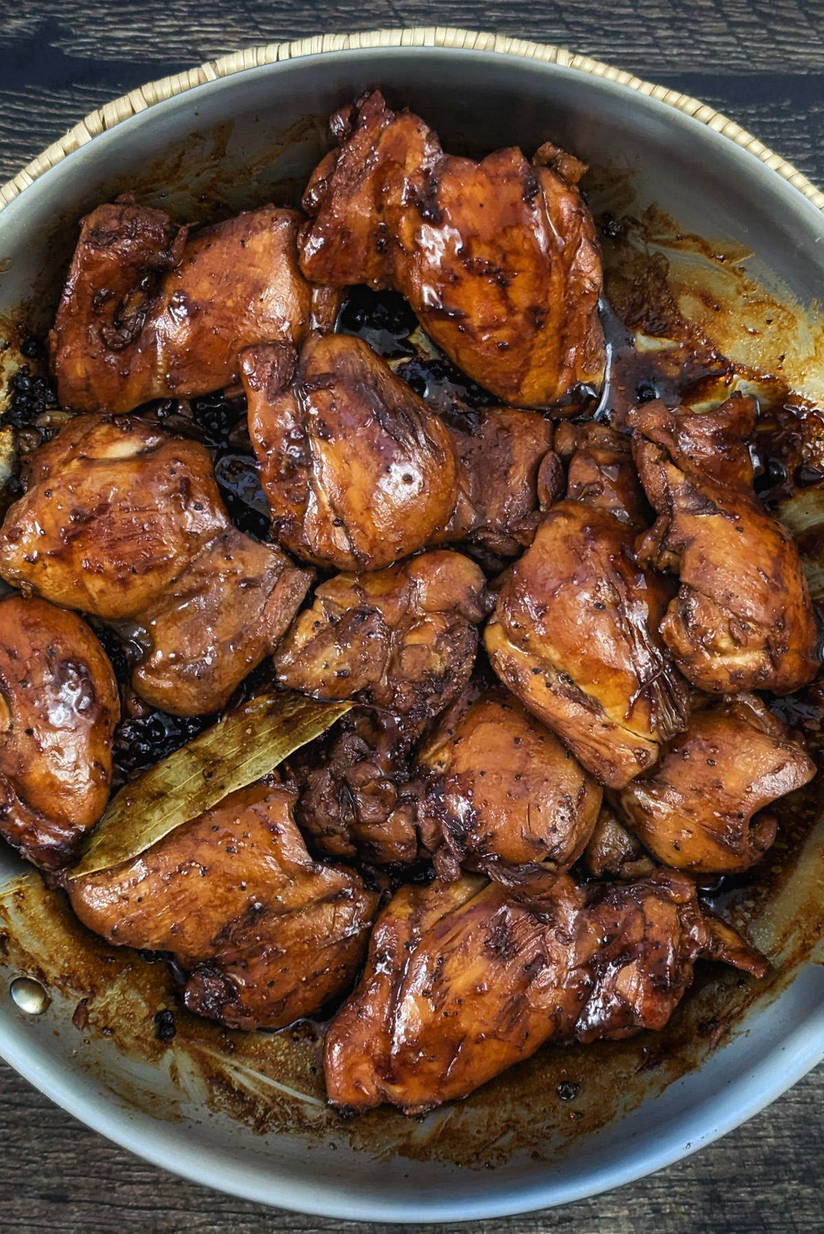 Chicken thighs in a pan.