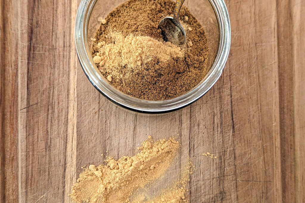 Ground ginger added to ground whole spices.