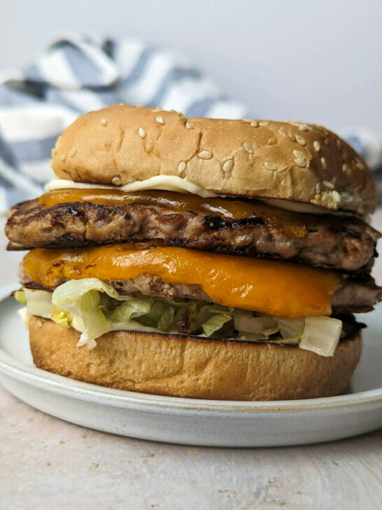 A close up of a double decker turkey smash burgers.