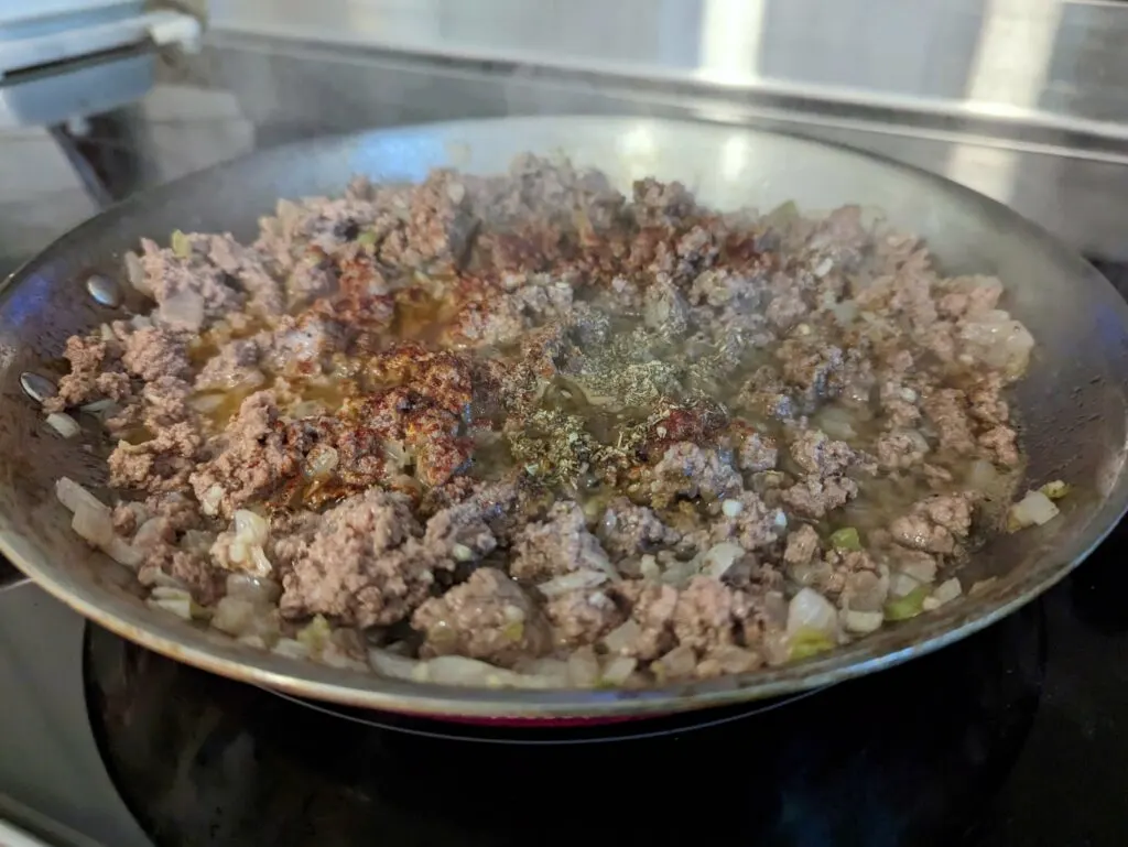 Spices added to the ground beef mixture.