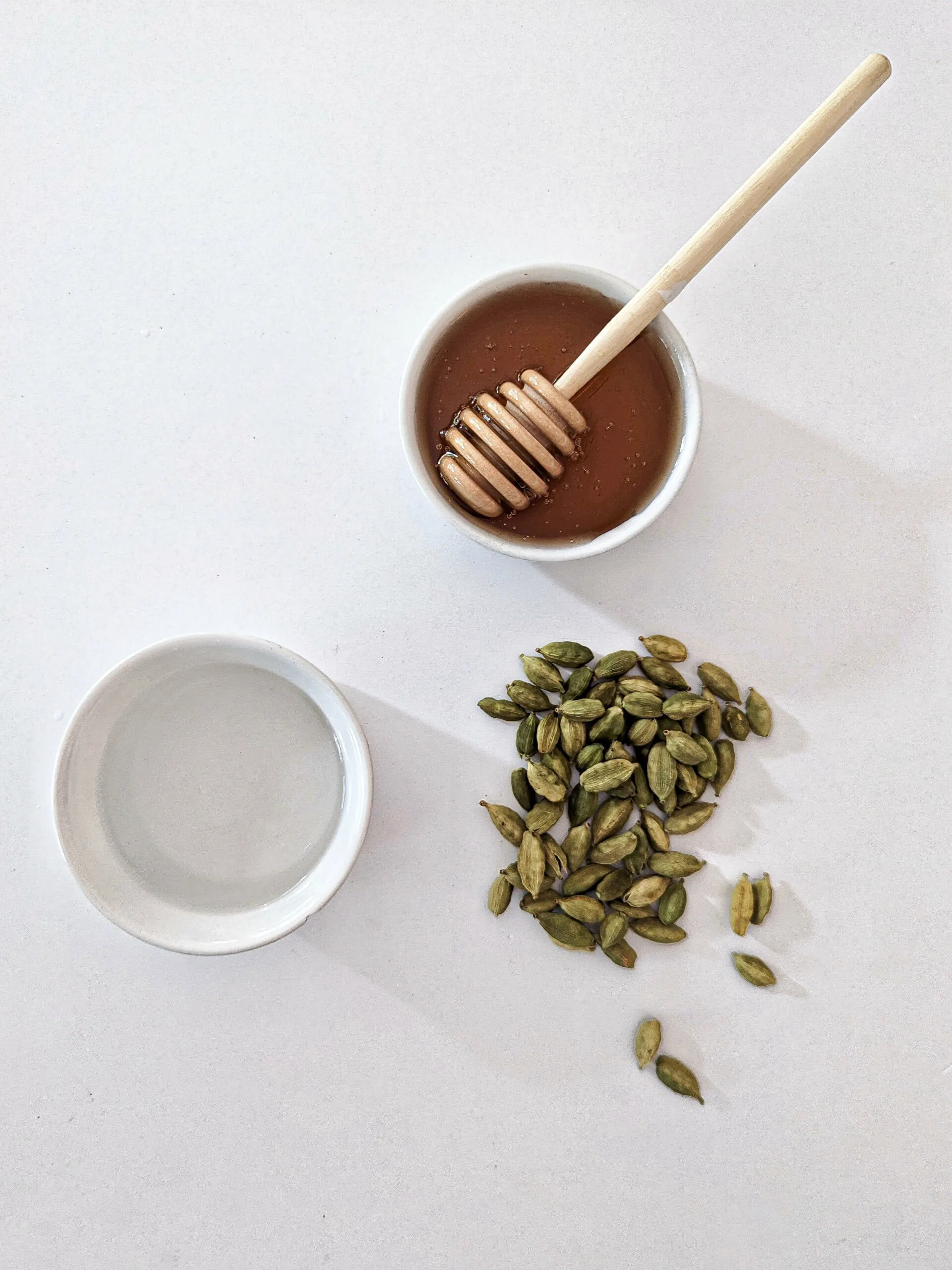 Ingredients for cardamom simple syrup.