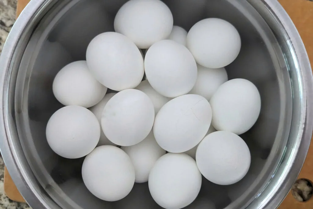 Hard boiled eggs in a bowl.