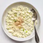 Egg Salad with Pickles in a serving bowl.