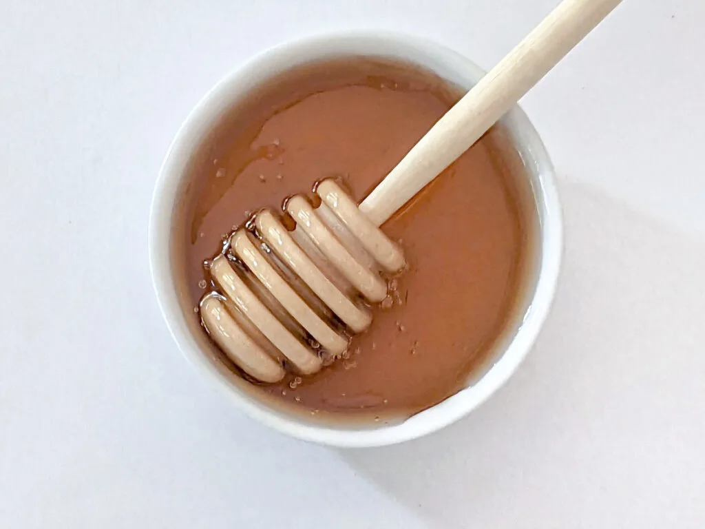 Honey in a small bowl.