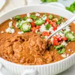 Refried beans in a serving bowl.