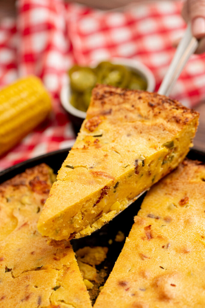 Slices of loaded cornbread on a plate.