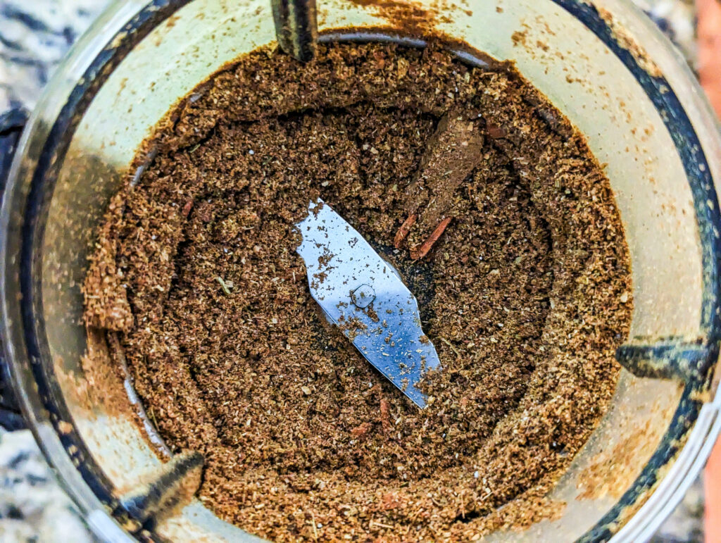 Whole spices in the spice grinder.