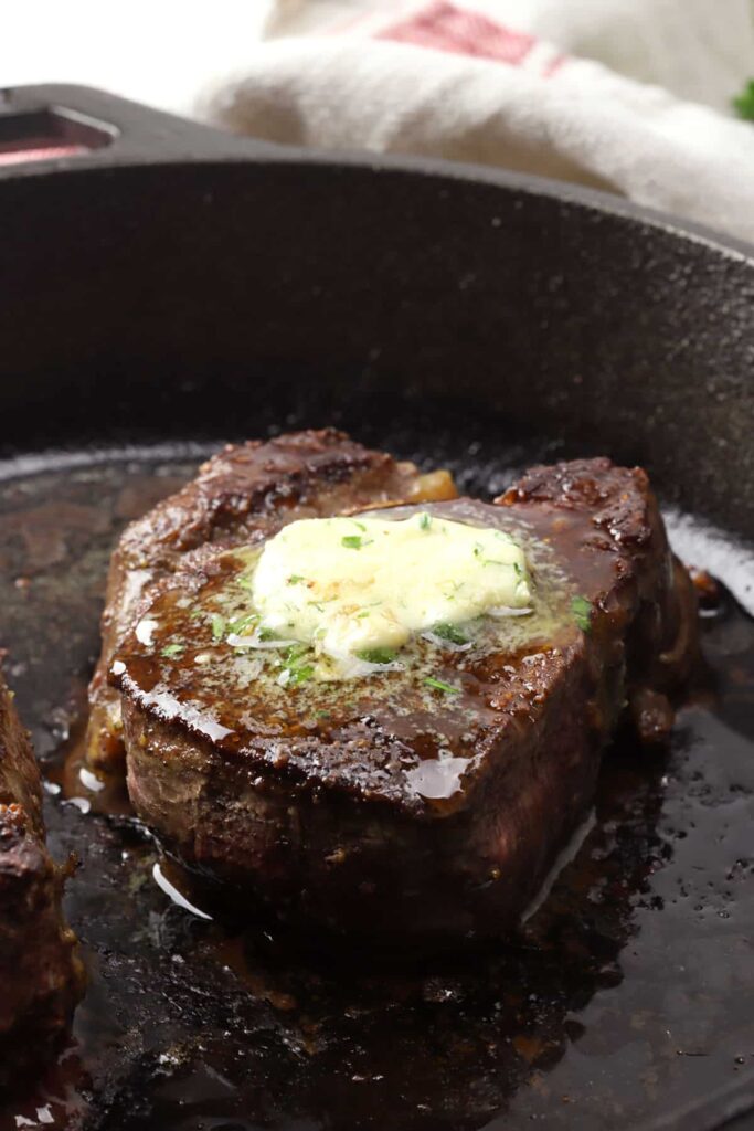 A steak fillet with compound butter.