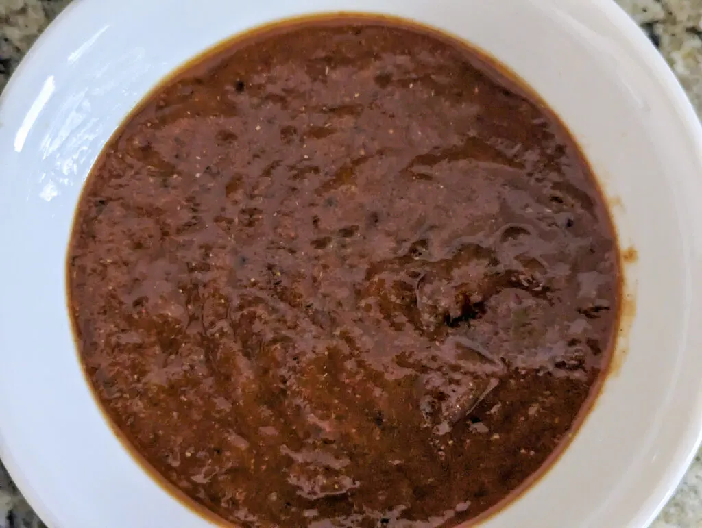 The tamarind chutney in a serving bowl.