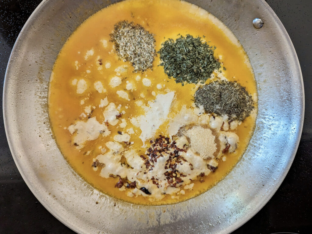 Heavy cream and spices added to the sauce.