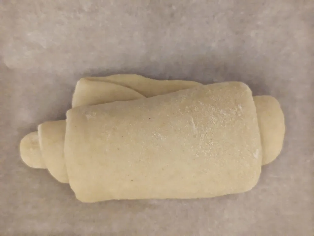 The dough rolled into a cylinder.  