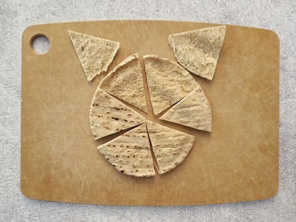 The cut pita chips sepeaated by layers.
