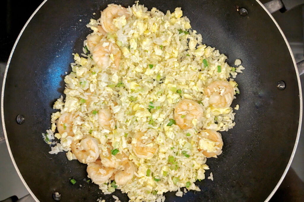 Shrimp and green onions added to the rice.