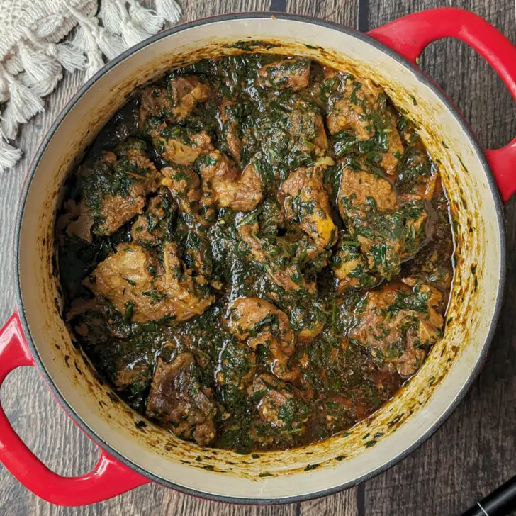 Palak gosht in a Dutch oven.