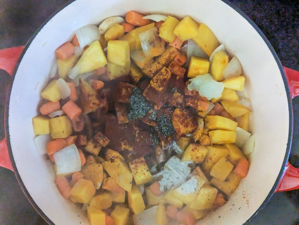 Spices added to the pot of vegetables.
