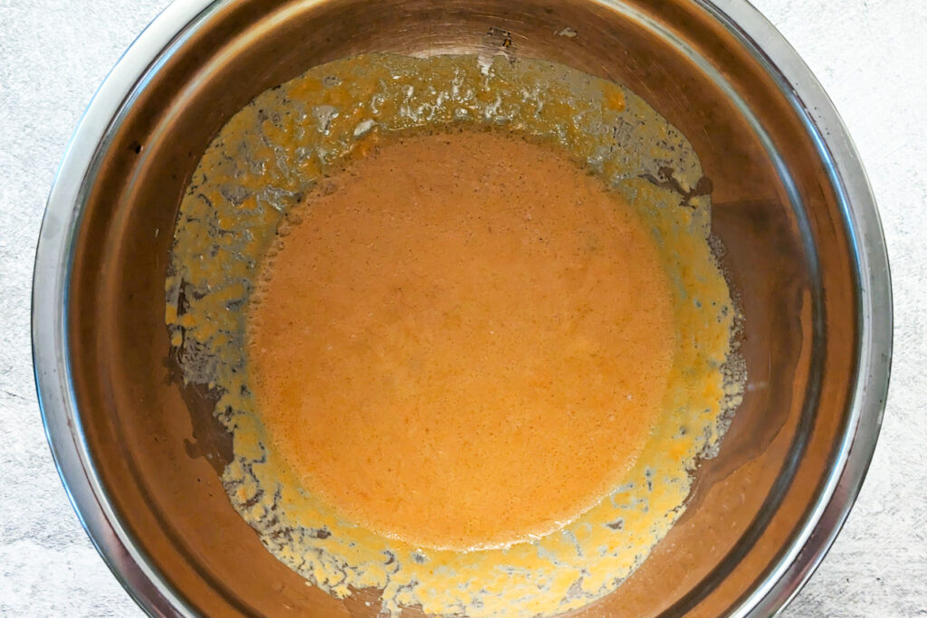 Wet ingredients in a bowl.