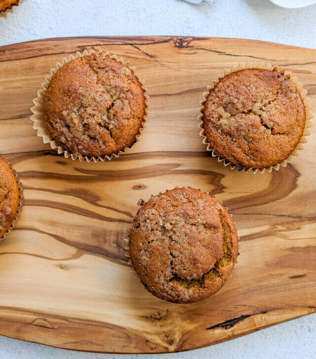 Kodiak Cakes Pumpkin Muffins on a wood board.