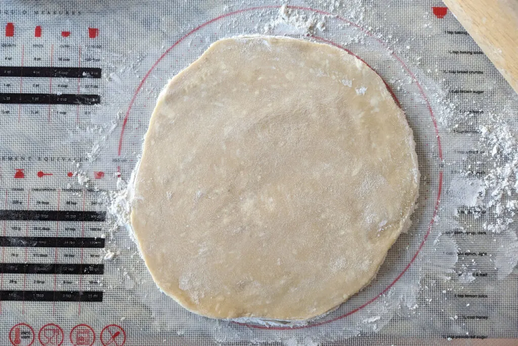 Flour mixture rolled out of a mat.