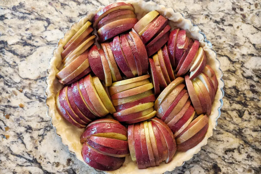 Apples added to the tart crust.