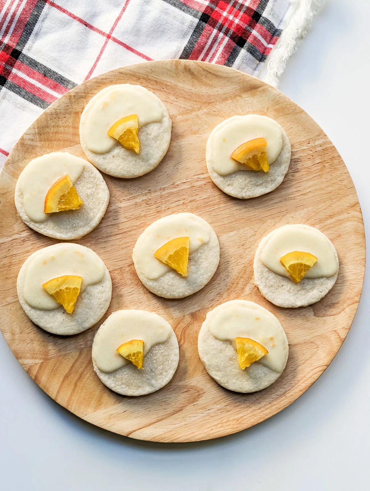 Orange cardamom cookies on a platter.
