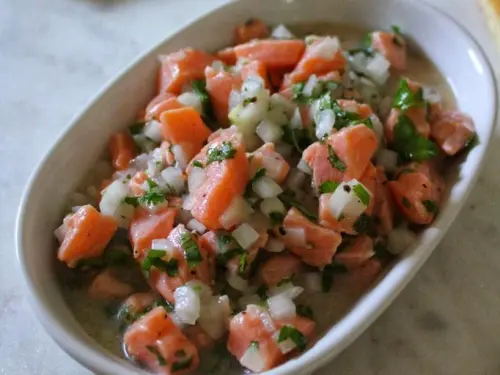 Salmon ceviche in a serving bowl.