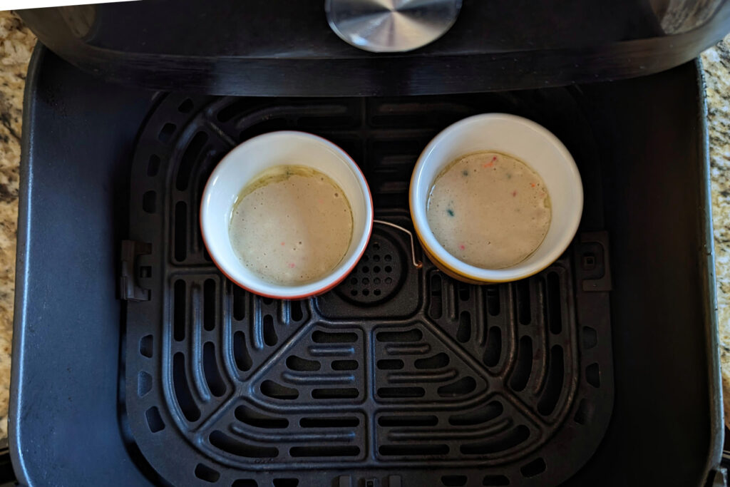 Mug cakes cooking in the air fryer. 
