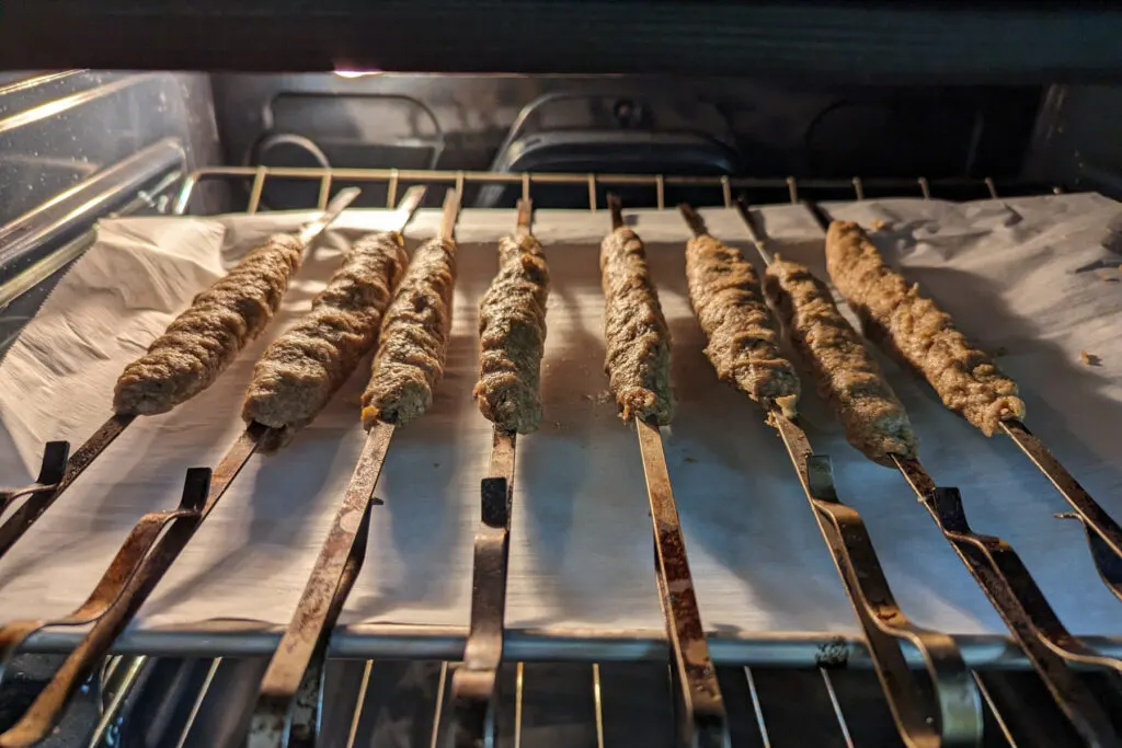 Beef Seekh Kabob baking in the oven.