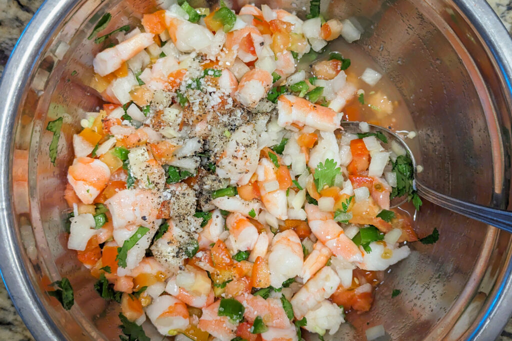 Vegetables added to the marinated shrimp.