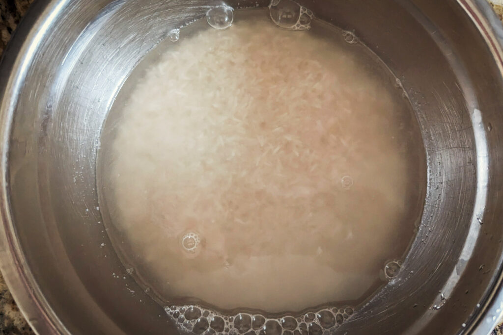 Rice soaking in water.