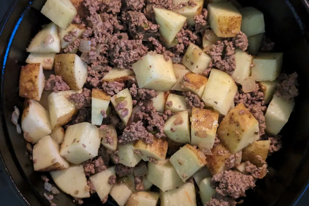 Potatoes added to the ground meat.