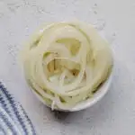 Pickled Yellow Onions in a small bowl.