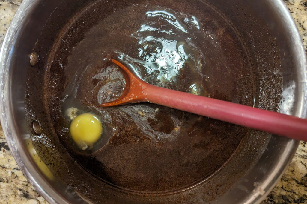 Add the sugar and then the eggs, one at a time.