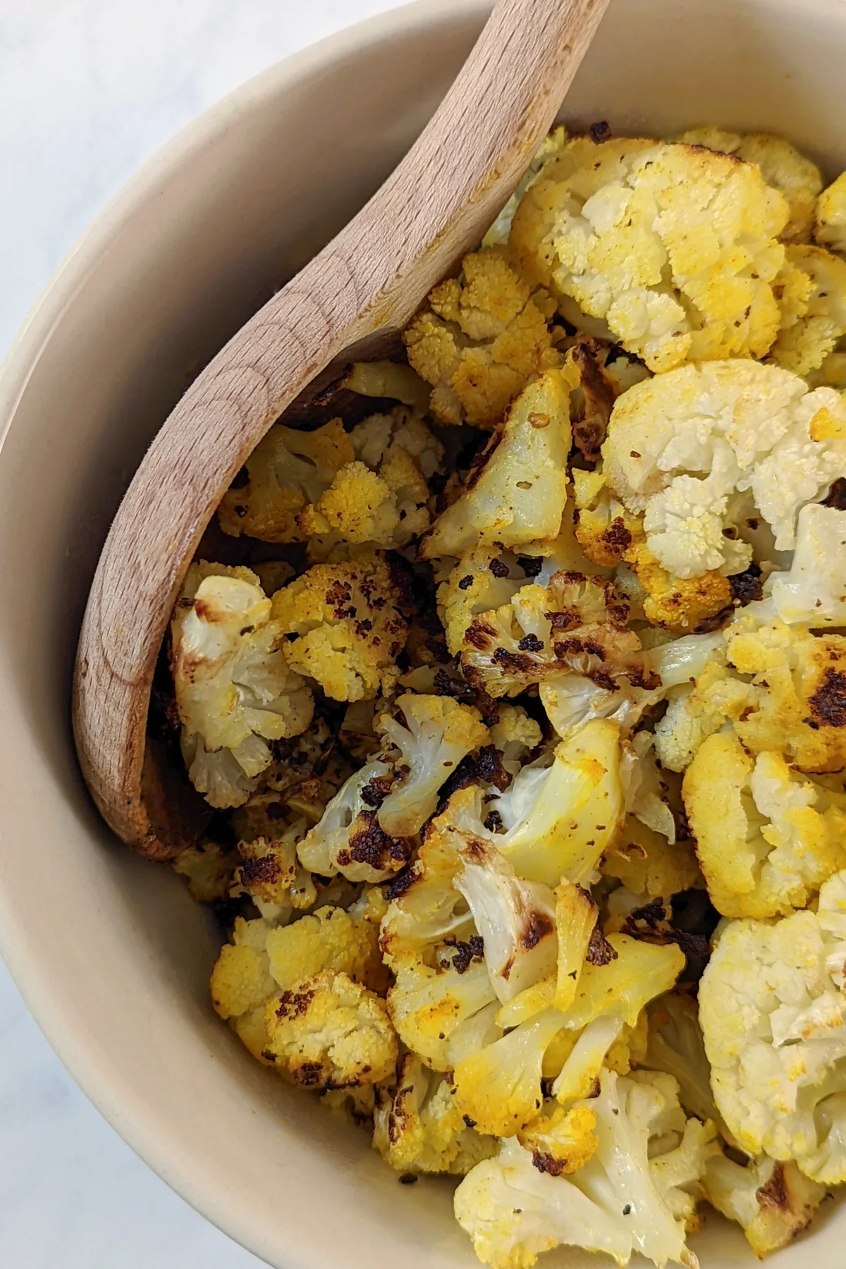Turmeric Roasted Cauliflower in a serving bowl.